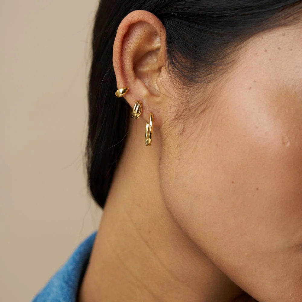 Mini Twist Micro Huggie Hoop Earrings - Image 2